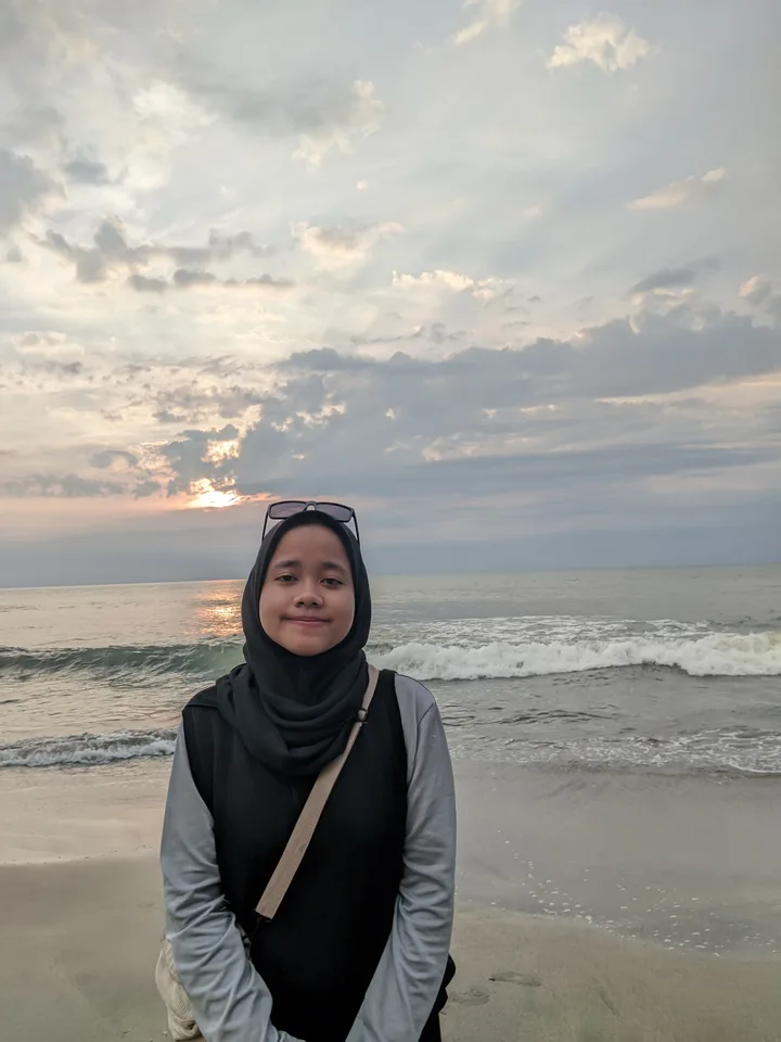 Senyum Triana Yuli Utami